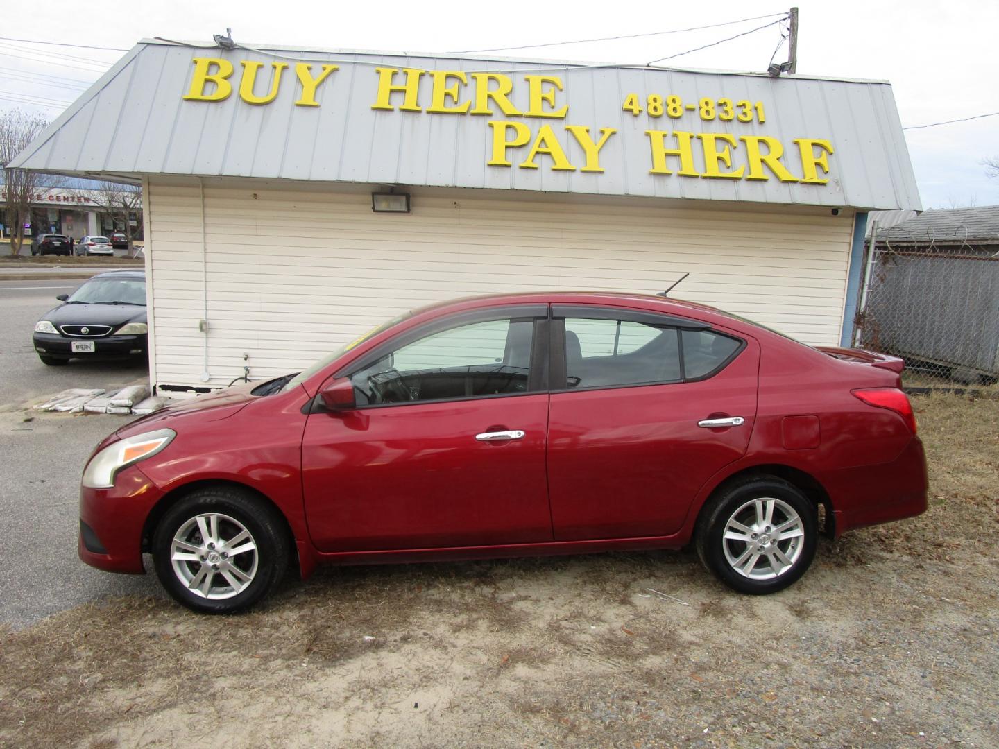 2016 Red Nissan Versa 1.6 S 5M (3N1CN7AP7GL) with an 1.6L L4 DOHC 16V engine, 5M transmission, located at 2553 Airline Blvd, Portsmouth, VA, 23701, (757) 488-8331, 36.813889, -76.357597 - Photo#0